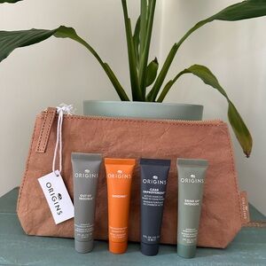 ORIGINS FACE MASK BUNDLE. 5 MASKS AND  A MAKEUP BAG!